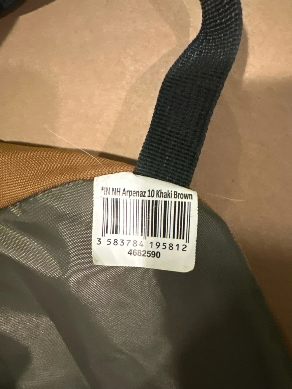 Quechua Green Backpack with Brown Base